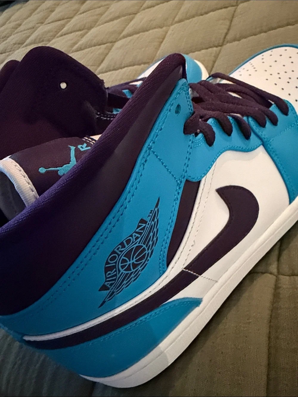 Nike Air Jordan Mid-Top Sneakers in White and Teal with Purple Accents